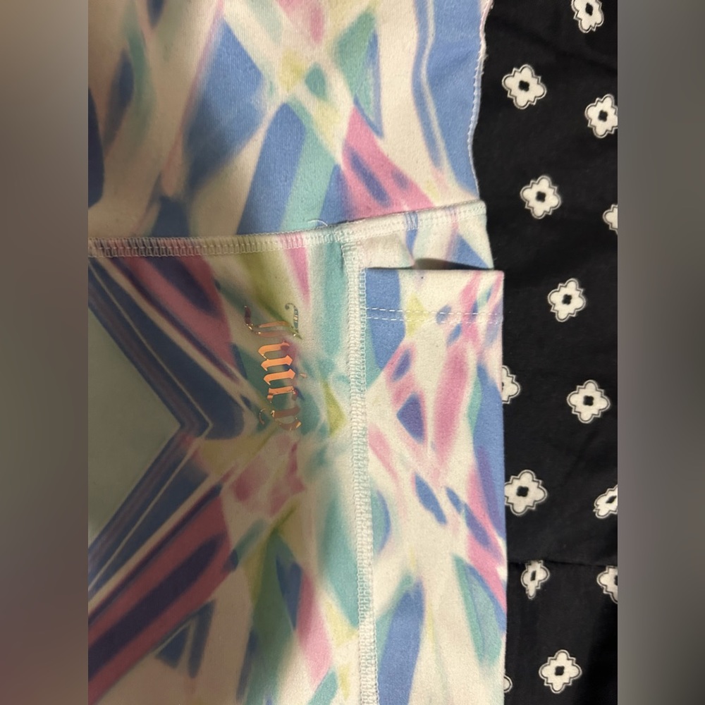 Used Juicy Couture mixed pastel colored 7/8 leggings & side pockets- size m